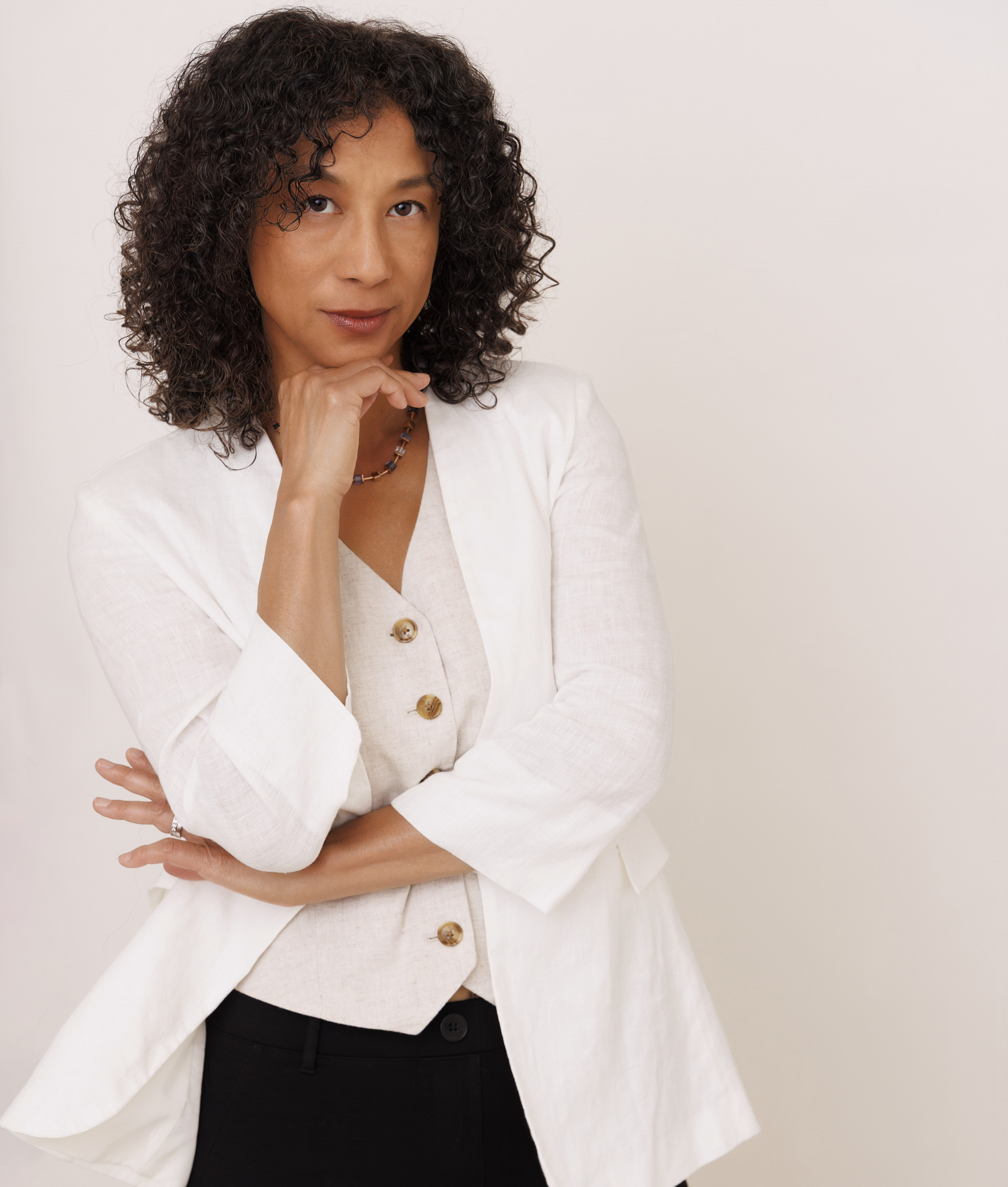 yumi with hand to her chin headshot3